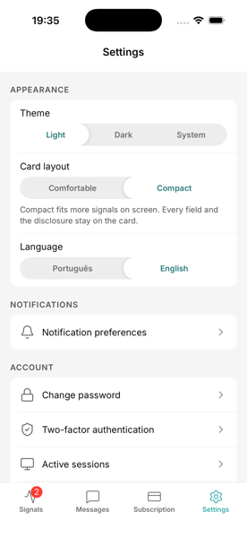 Settings screen showing theme, card layout, and language options